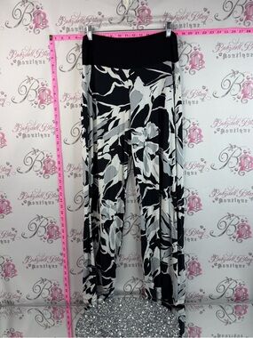 Dolcezza Wide Leg Palazzo Pants - Black background with a White Floral Print